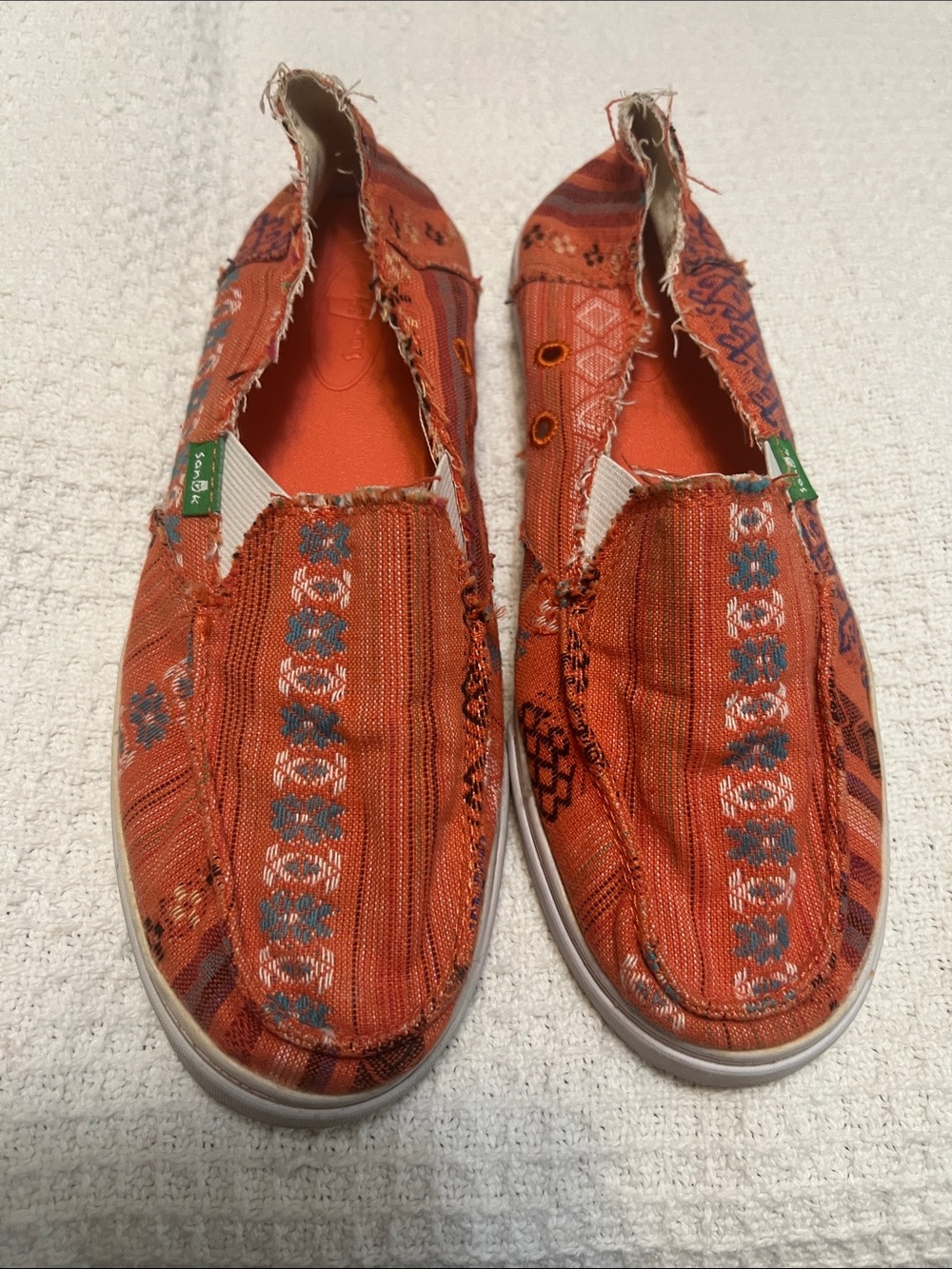 Sanuk Orange Patterned Slip-On Sneakers